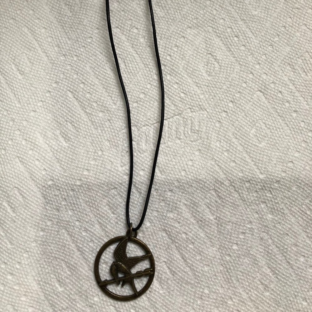 Lions Gate Films Hunger Games Mockingjay Brass Medallion pendant on Black Cord
